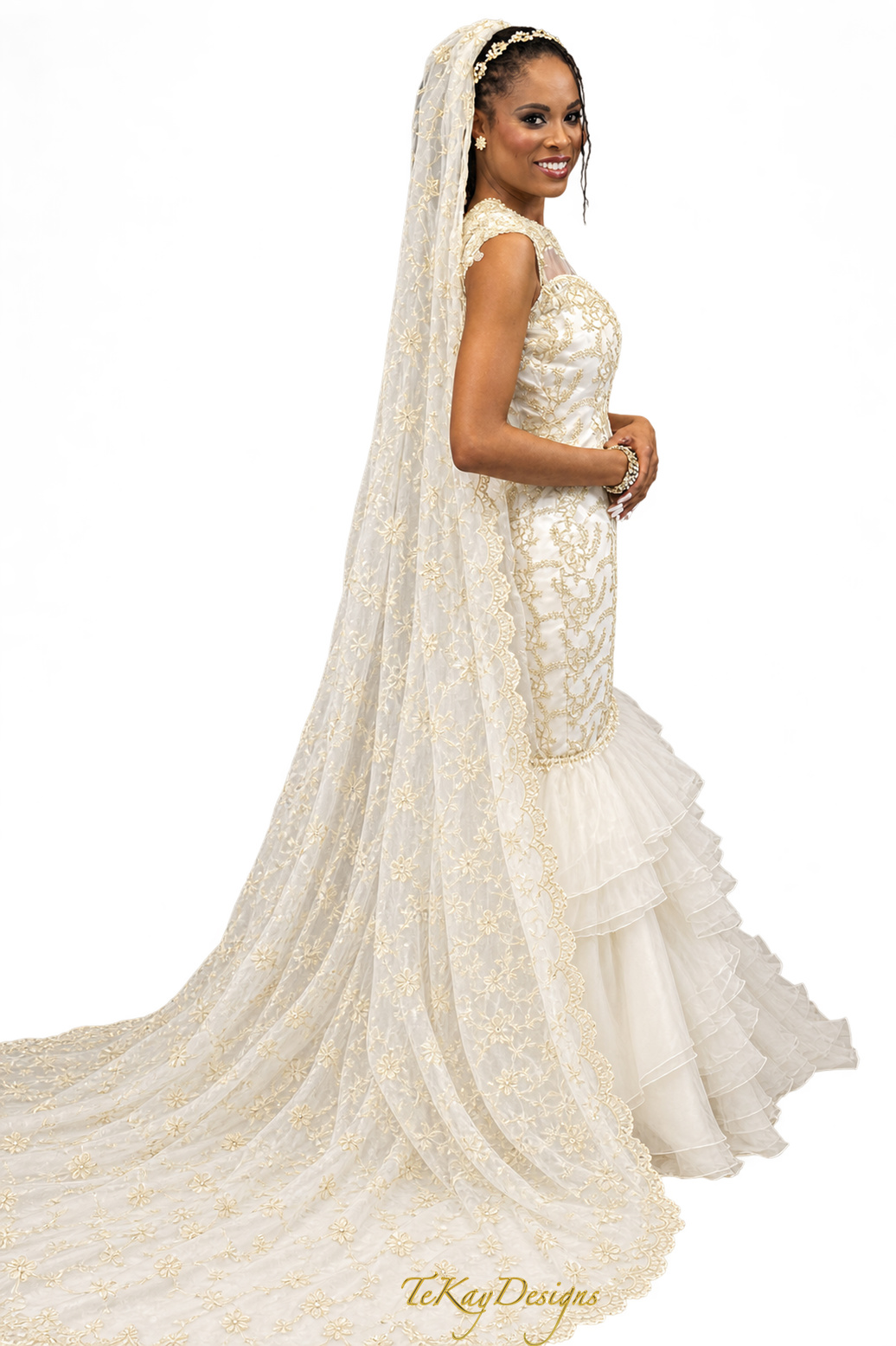 Bridal gown and cathedral gown and veil